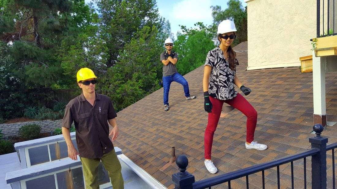 Charlie Johnson, CEO Makello, instructs Bhavna Gupta and Nishank Sheth, Energy Efficiency interns, for safe techniques on roof inspections and solar site surveys.