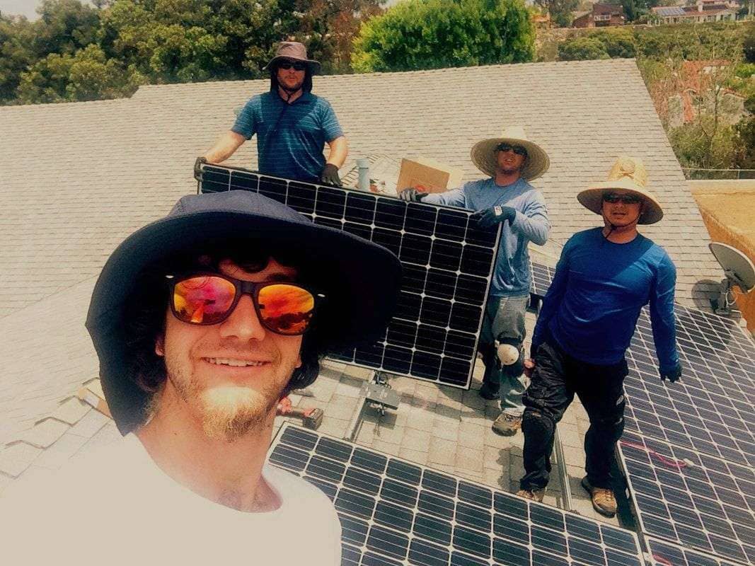 Bryce, Steve, Albert, and Tan complete a 3.355kW with solar panel upgrade in Cardiff.