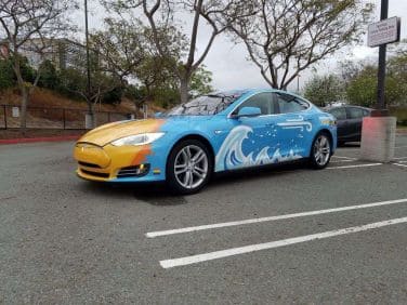 Tesla Model S with renewable energy theme at 2019 Drive Electric Earth Day San Diego.