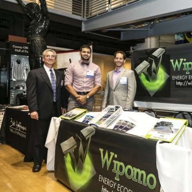 Dan Gibbs, Ashiq Syed and Charlie Johnson staff the Makello sponsor table at the San Diego Business Journal's General Council Awards event.