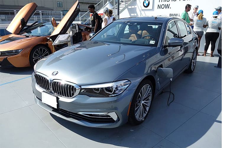 PHEV 2019 BMW 530e xDrive iPerformance AWD: 9kWh battery @ 2.0mi/kWh = 14mi EV range; 12.1gal. @ 28.6MPG = 346mi ICE Range; 360 mi Total Range, 278 Total hp. MSRP=$55,700