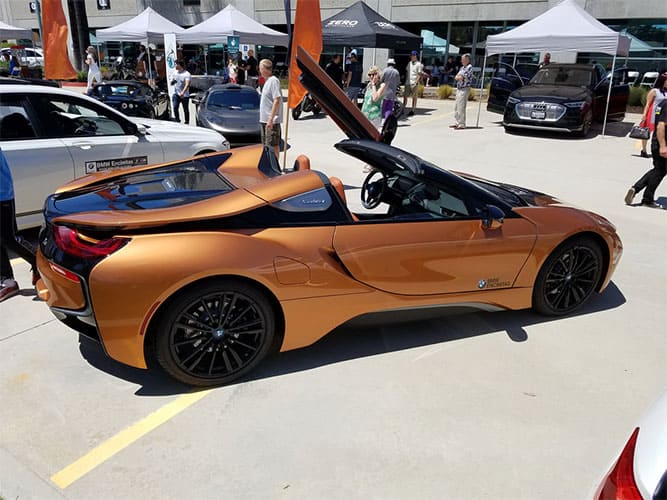 PHEV 2019 BMW i8 Roadster AWD: 12kWh battery @ 2.0mi/kWh = 17mi EV range; 11.1gal. @ 27.3MPG = 303mi ICE Range; 320 mi Total Range, 369 Total hp. MSRP=$163,300