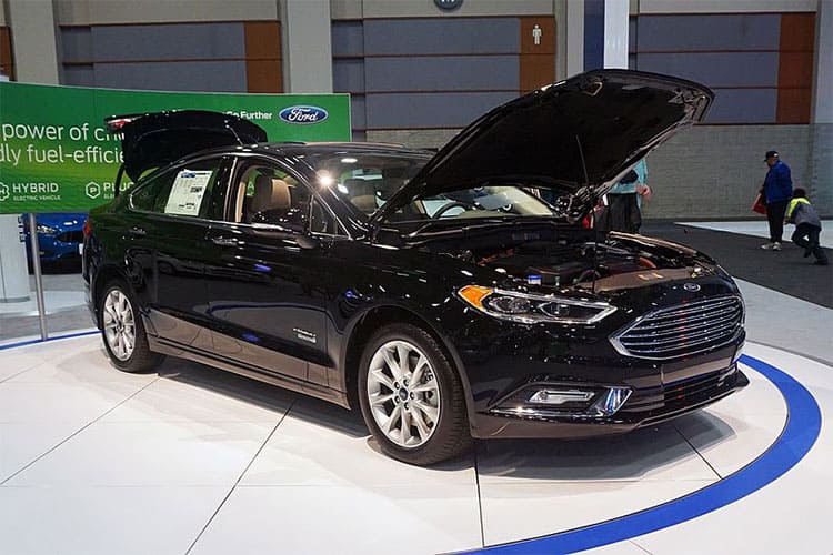 PHEV 2019 Ford Fusion Energi - Titanium FWD: 9kWh battery @ 3.0mi/kWh = 26mi EV range; 14gal. @ 41.7MPG = 584mi ICE Range; 610 mi Total Range, 259 Total hp. MSRP=$34,595