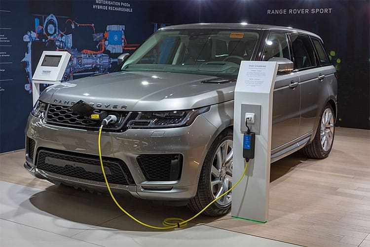 PHEV 2019 Land Rover Range Rover Sport P400e AWD: 13kWh battery @ 1.6mi/kWh = 20mi EV range; 23.8gal. @ 23.1MPG = 550mi ICE Range; 570 mi Total Range, 410 Total hp. MSRP=$79,000