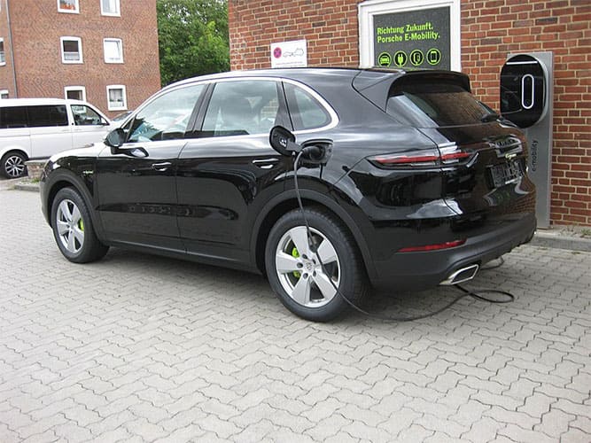 PHEV 2019 Porsche Cayenne E-Hybrid AWD: 14kWh battery @ 1.4mi/kWh = 19.15485mi EV range; 21.4gal. @ 22.5MPG = 481mi ICE Range; 500 mi Total Range, 474 Total hp. MSRP=$79,900